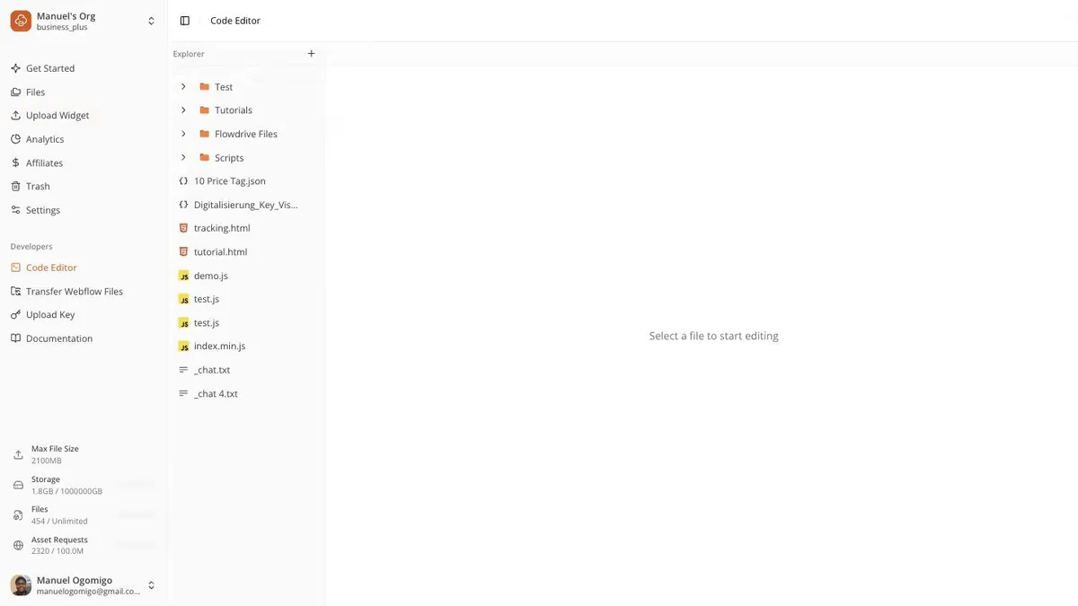 Flowdrive code editor with a file tree containing JavaScript, HTML, JSON and text files alongside image assets